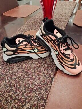 Nike Air Max Torch sneakers featuring a coral orange mesh upper W 8.5